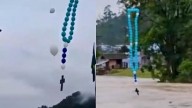 Rosário feito de balões em honra a Nossa Senhora Aparecida toca as águas de rio com níveis perigosamente elevados em Santa Catarina (vídeo)